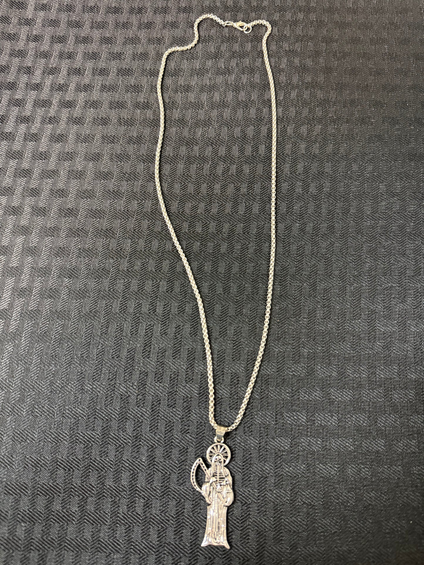 Dije de La Santa Muerte