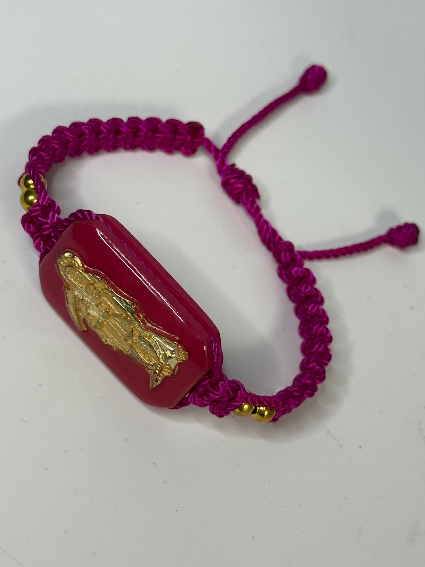 Pulsera De La Santa Muerte Tejida a Mano con (dorada) /Hand-woven Santa Muerte bracelet with (gold)
