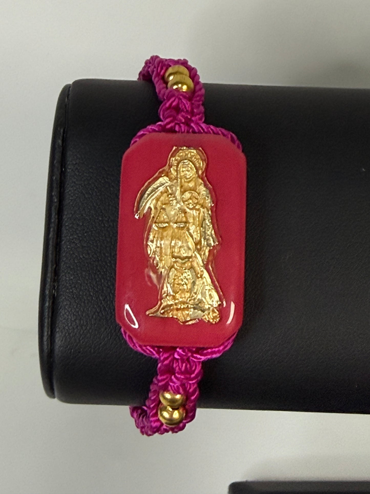Pulsera De La Santa Muerte Tejida a Mano con (dorada) /Hand-woven Santa Muerte bracelet with (gold)